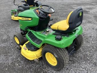 Газонокосарка John Deere X320 foto 3
