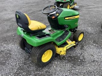 Газонокосарка John Deere X320 foto 2