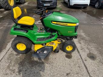 Газонокосарка John Deere X 300 foto 2