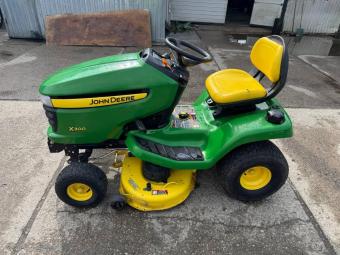 Газонокосарка John Deere X 300 foto 5