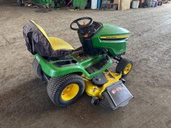 Газонокосарка John Deere X 320. foto 10