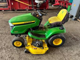 Газонокосарка John Deere X 320. foto 6